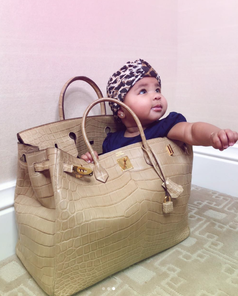 little baby in her bag in her birkin