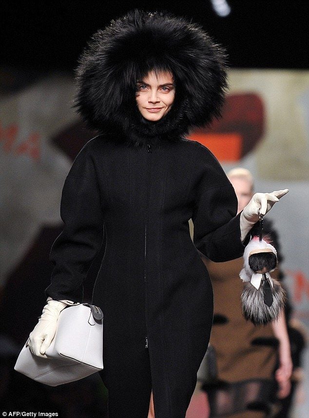 Cara-Delinvingne-strutting-with-Karlito