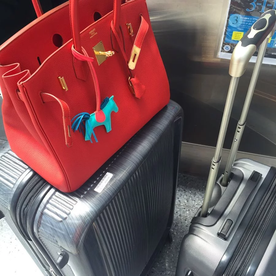 Miss Vermillion B takes her maiden voyage as she boards a 15 hour non-stop flight to the other side of the world! Certainly no 'admiration phase' this time...