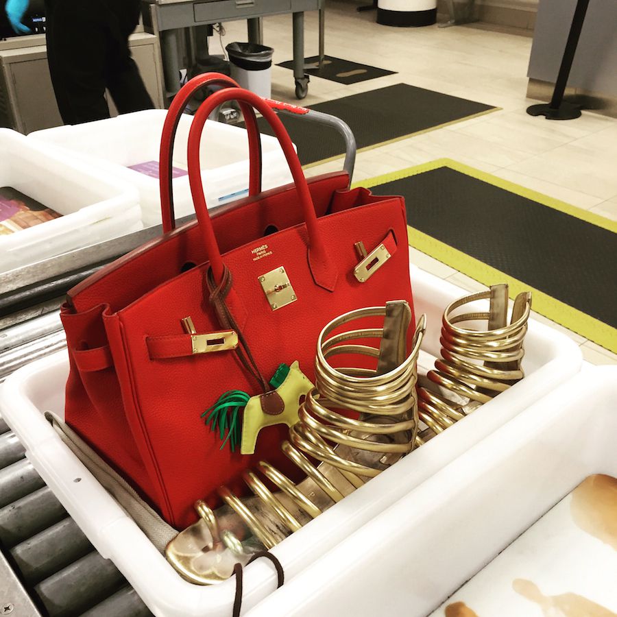 The Danger of Traveling with Fake Designer Bags - PurseBop