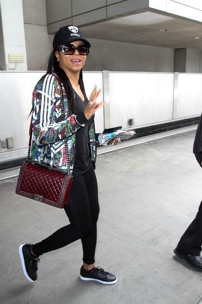 Celebrities Carrying Handbags at the Airport