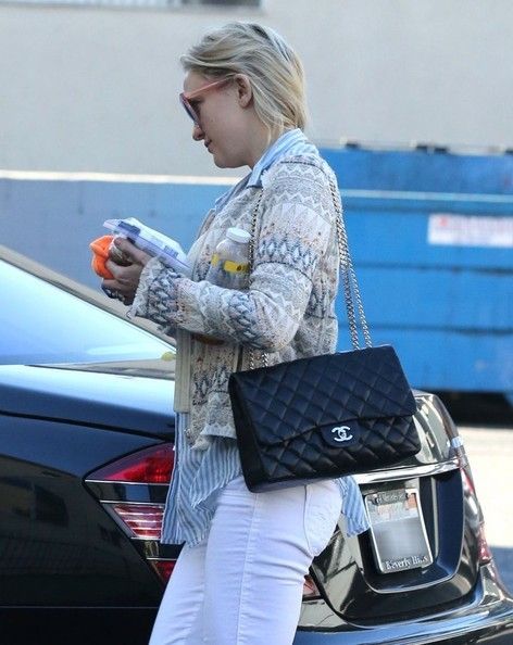 Miley Cyrus Carrying Chanel Bags