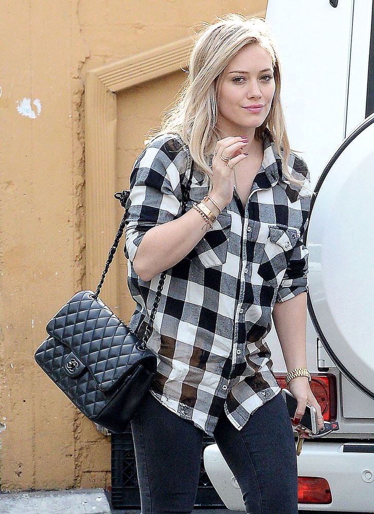 Hilary Duff Doubles Up with Bags from Louis Vuitton and Goyard