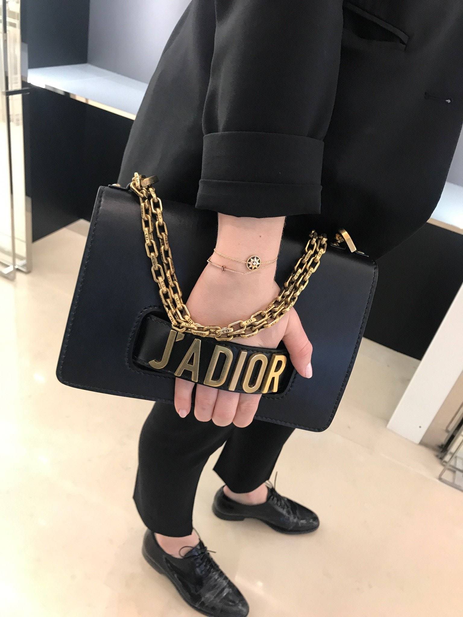 dior hand clutch