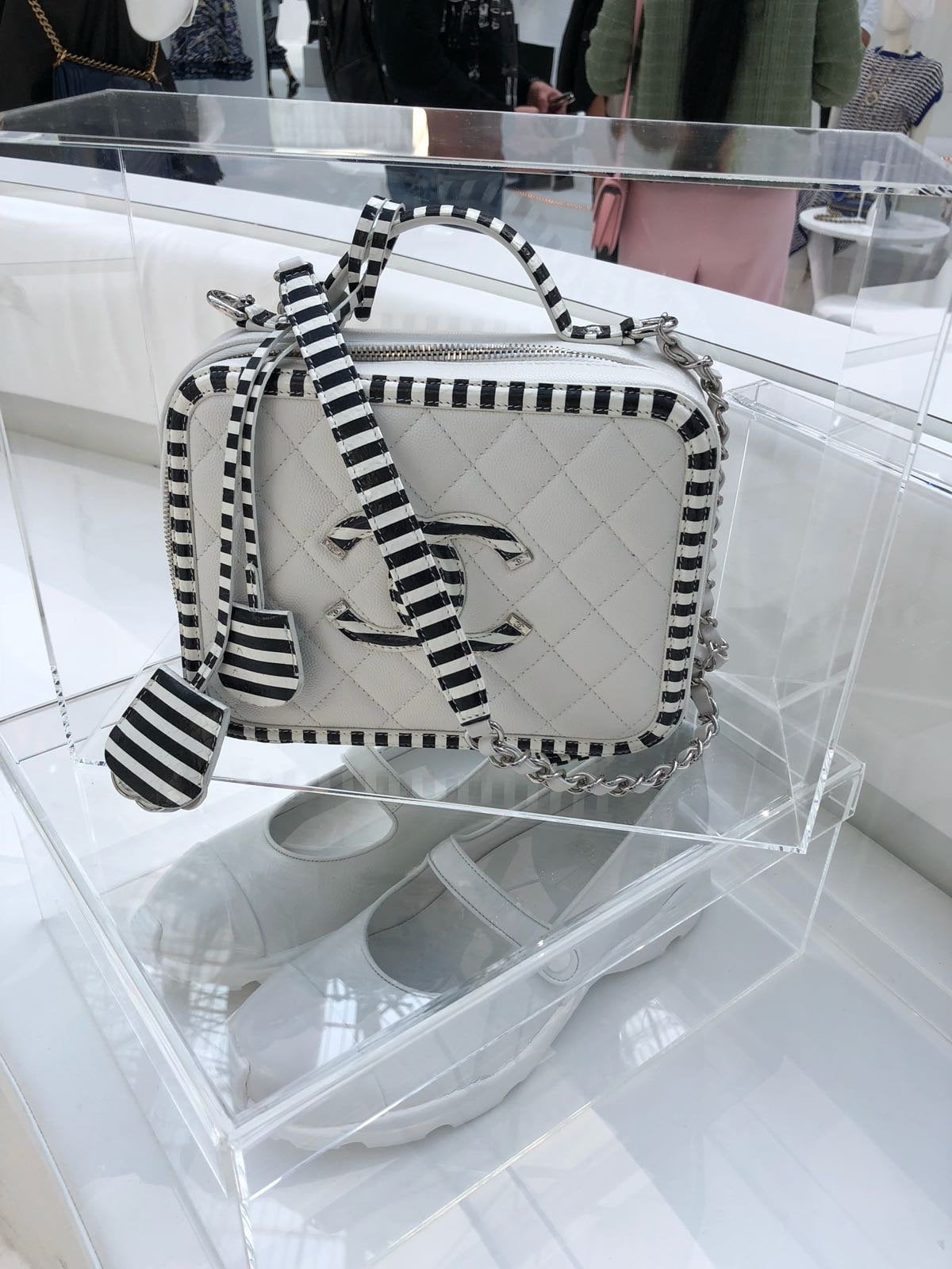 Face-Off: Chanel Jungle Stroll versus Hermes Evelyne - PurseBop