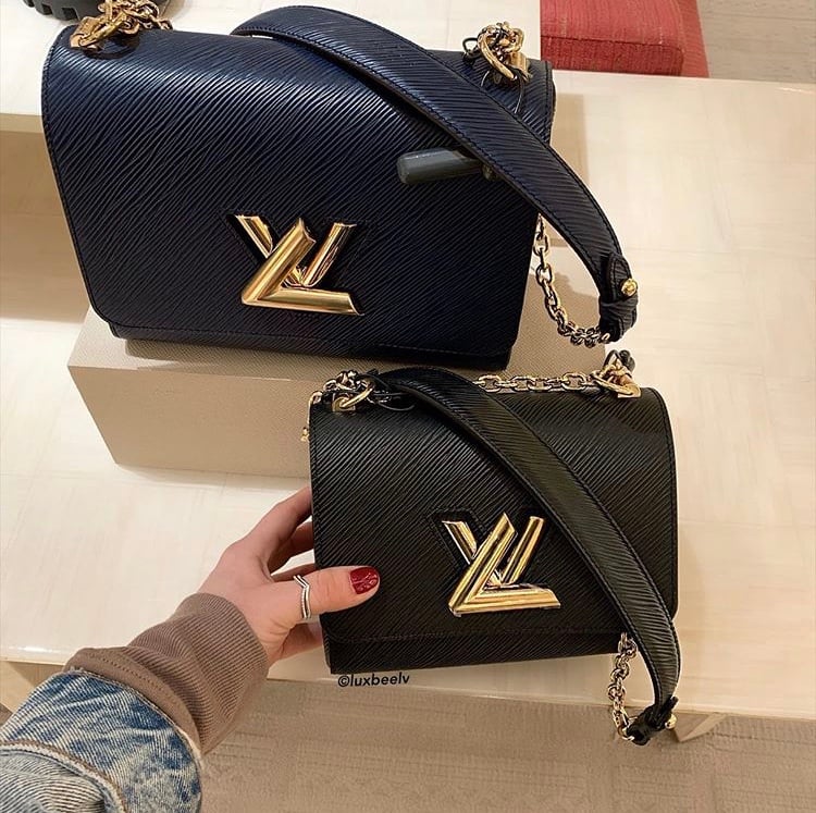 Twist: LV Brand Mark Twist Lock Handbags