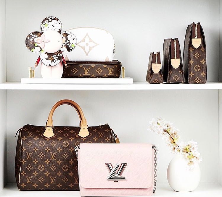 Twist: LV Brand Mark Twist Lock Handbags