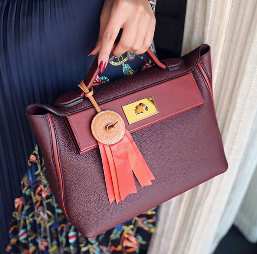 Shop HERMES 24/24 - 21 Verso Bag (H082817CKAM) by Camellianectar