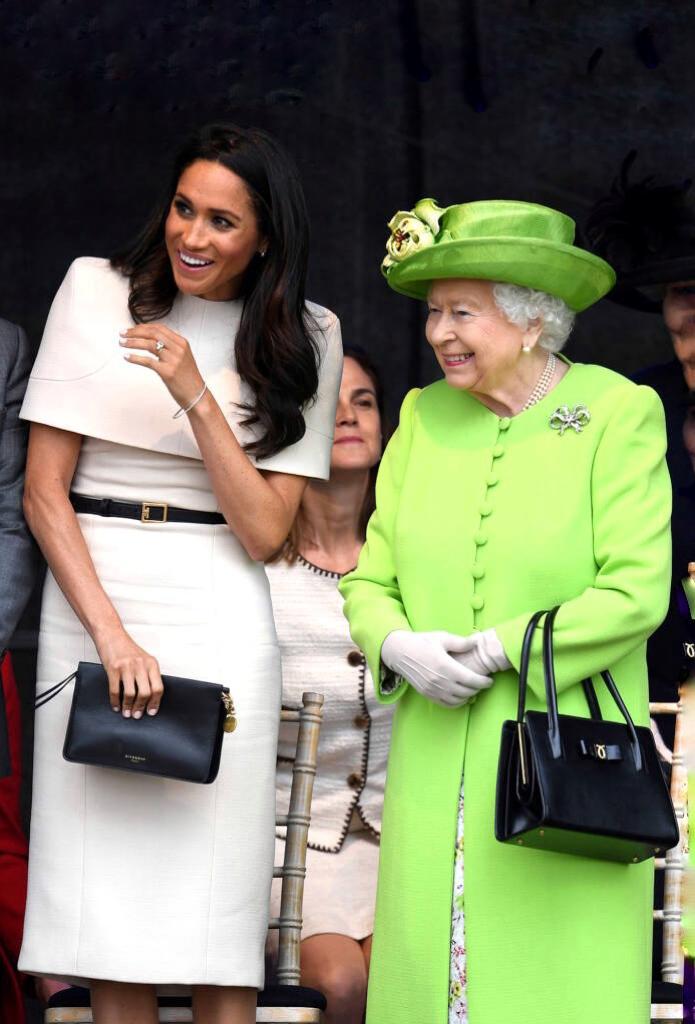 Royal fashion: Queen Elizabeth's black Launer handbag holds 52