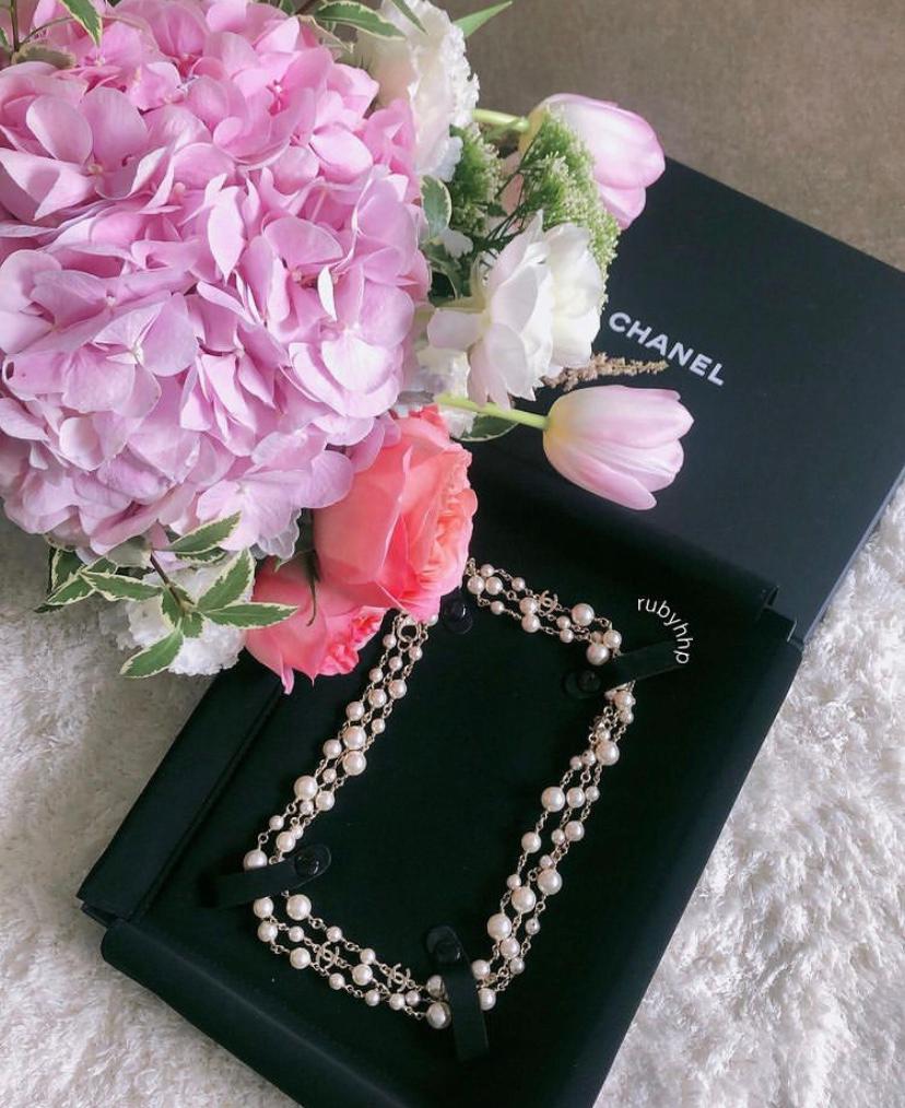 Chanel black and white pearl necklace with black slip dress.  #chanelnecklace | Chanel necklace, Necklace, Park lane jewelry