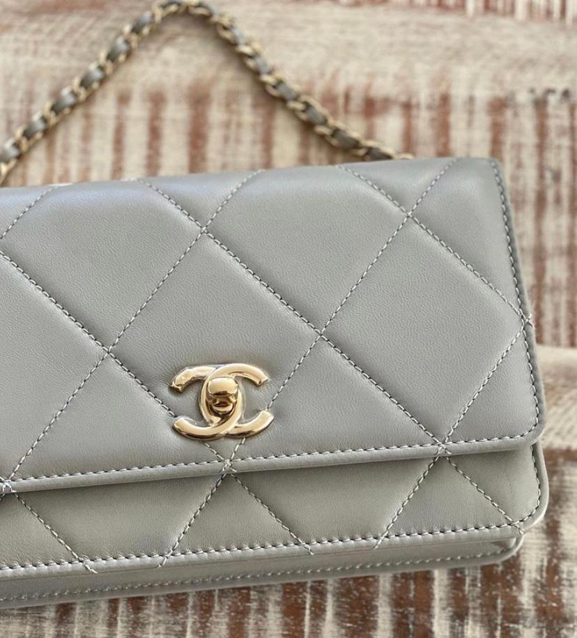 Chanel Classic Quilted WOC With Signature Charm