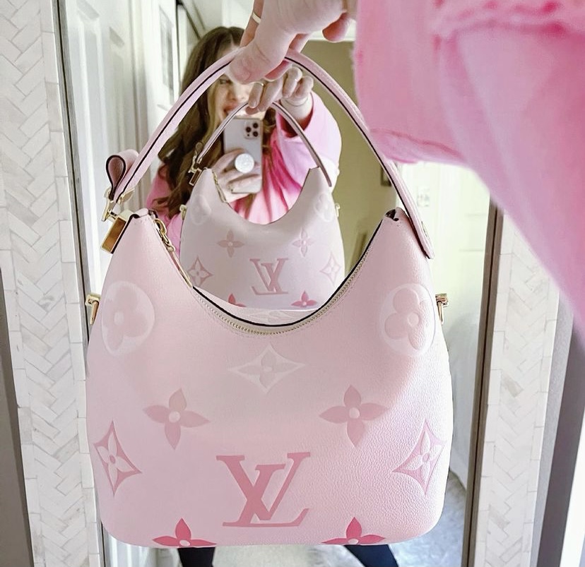 Miss Gypsi is getting the pink LV bag for her bday! aww she will LOVE it  I'm sure ;)