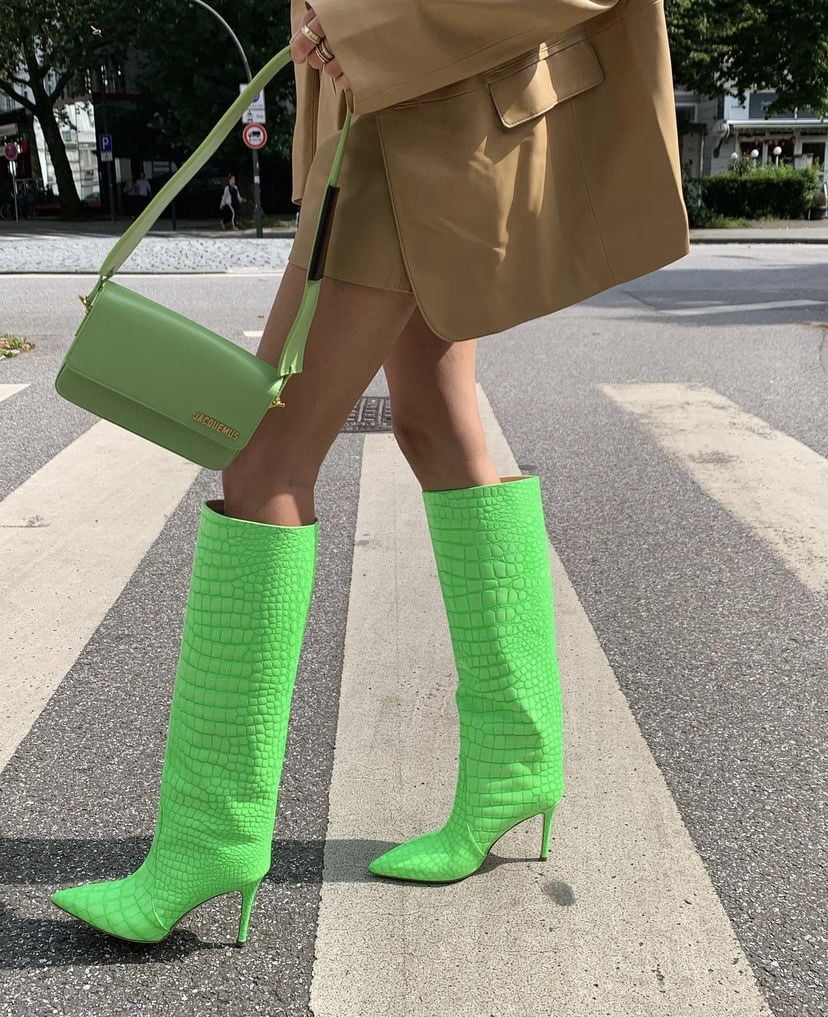 Leonie Hanne seen wearing a purple fendi baguette bag, a green long News  Photo - Getty Images