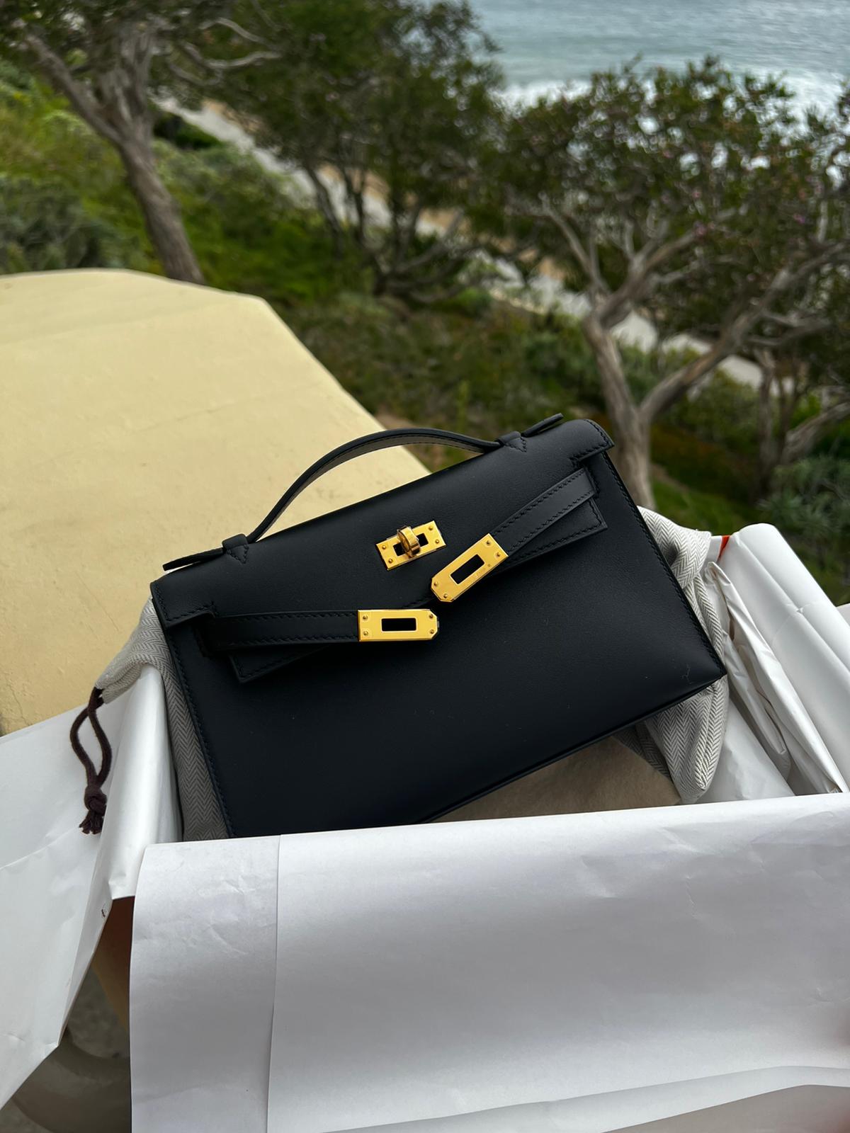 pochette hermes mini