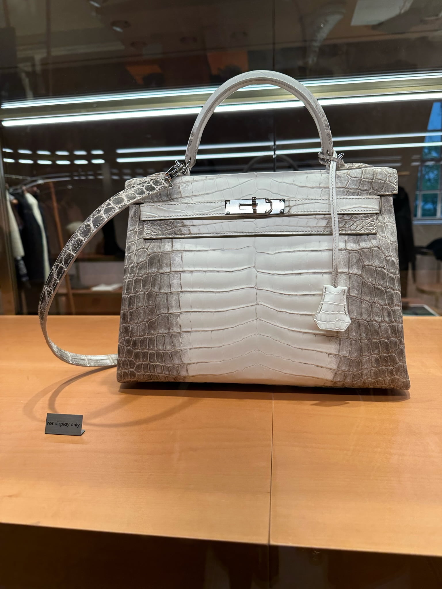 Meet the Hermès Himalaya Diamond Kelly in size 28. Which handbag