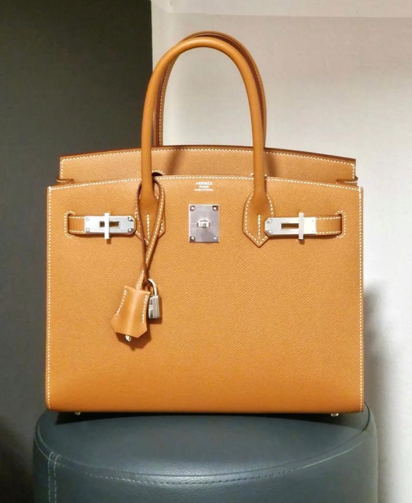What's the difference between Hermes Birkin Retourne and Birkin Sellie