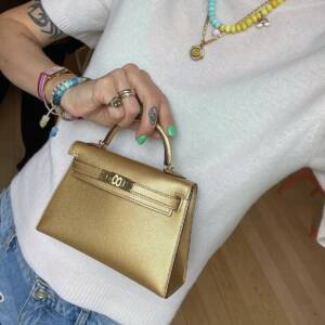 2023 handbag trends | 2023 bags | 2023 trending fashion | hermes ss23 | hermes gold mini kelly | how to buy a mini kelly