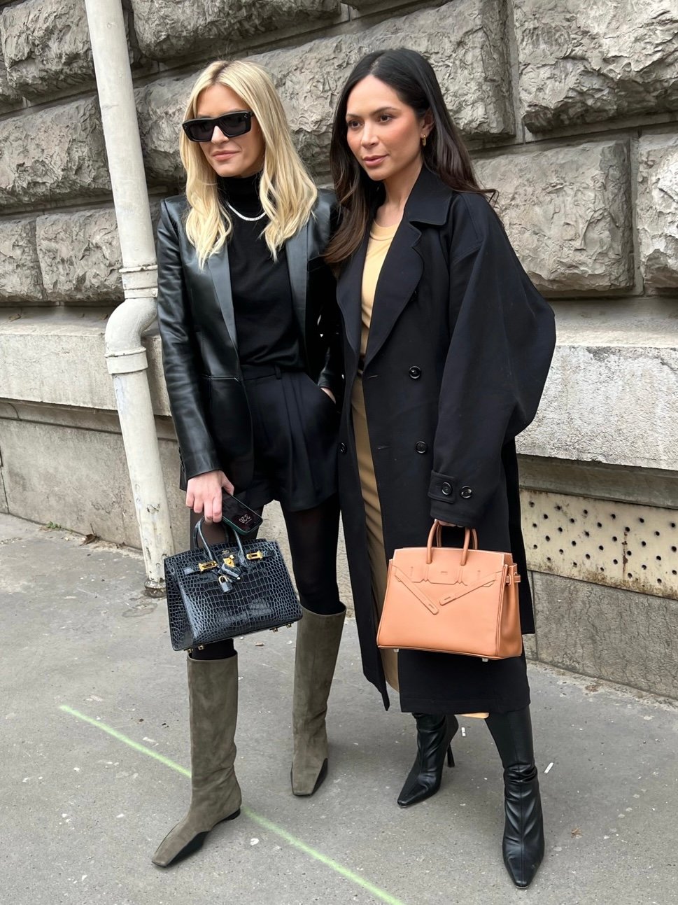 Paris, France - October, 1: woman wearing vintage Kelly 32 bag from Hermes  in burgundy calf box leather, street style outfit details. 素材庫相片