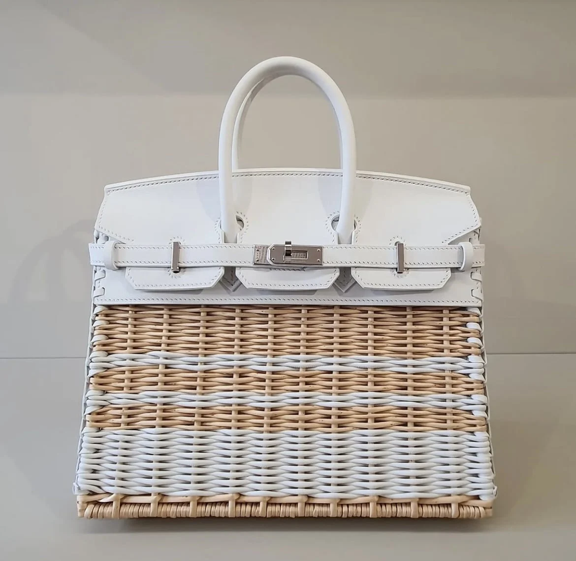 Celine redesigns the Triomphe Canvas in white for Spring/Summer 2021