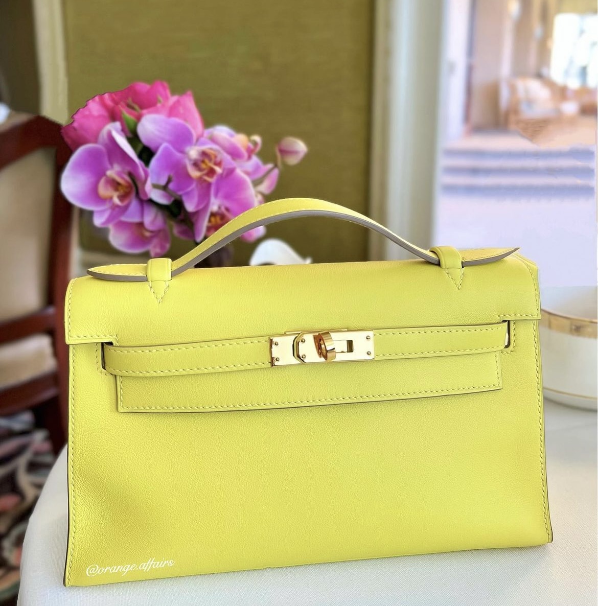 pochette lime swift leather