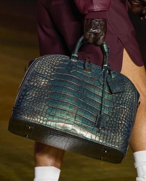 Pharrell's Debut at Louis Vuitton Men's 2024 Spring Summer: A Look at the  LoVers Bags - PurseBop