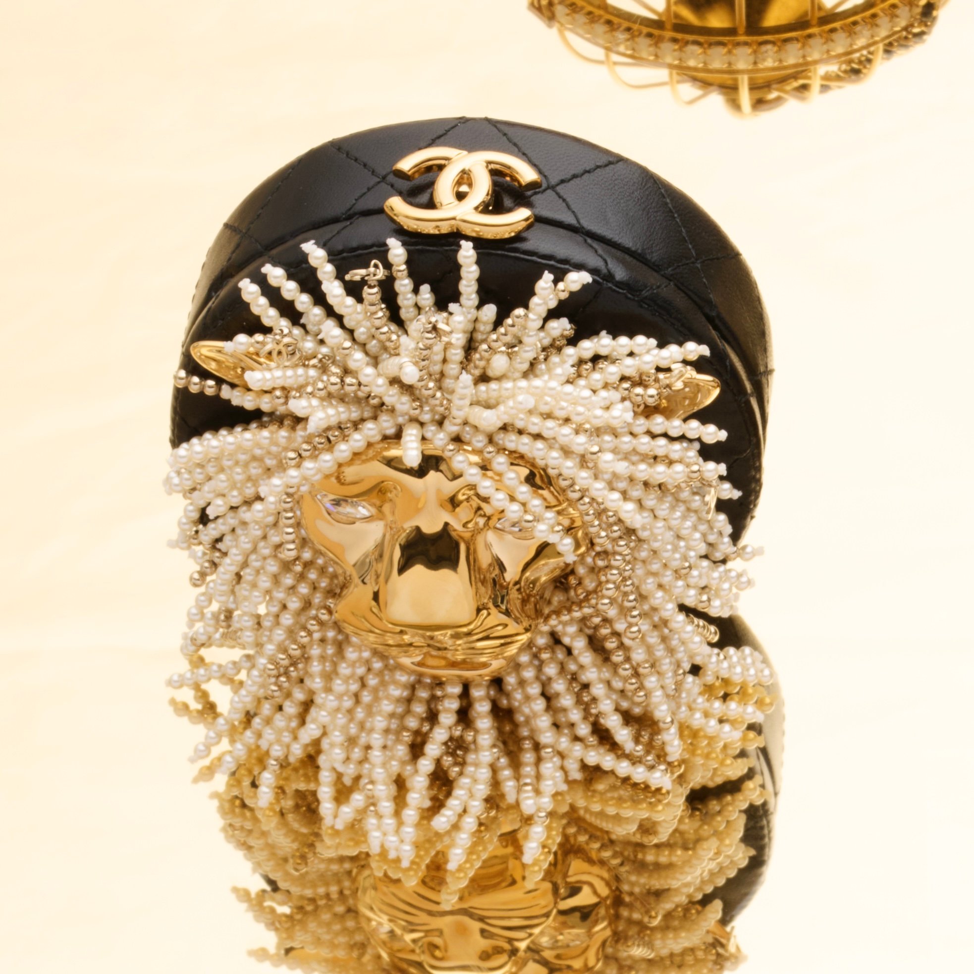 Chanel Métiers d'Art Black Quilted Lambskin Leather, Pearl, & Strass Lion Head Minaudière