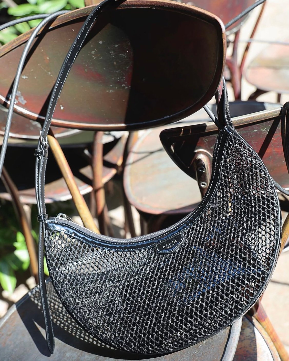 AlaïaOne Piece Demi Lune mesh shoulder bag
