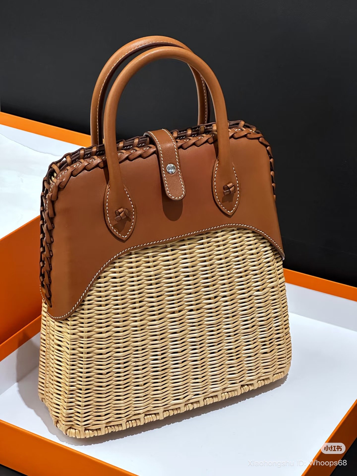 hermes Bolide 25 Picnic blends smooth Barénia leather with hand-woven Osier rattan