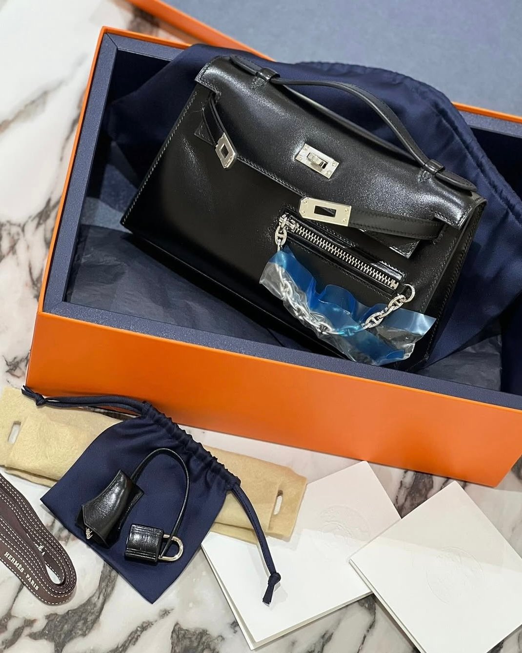 Hermès kelly pochette rock black box calfskin palladium birkin rock horizon line