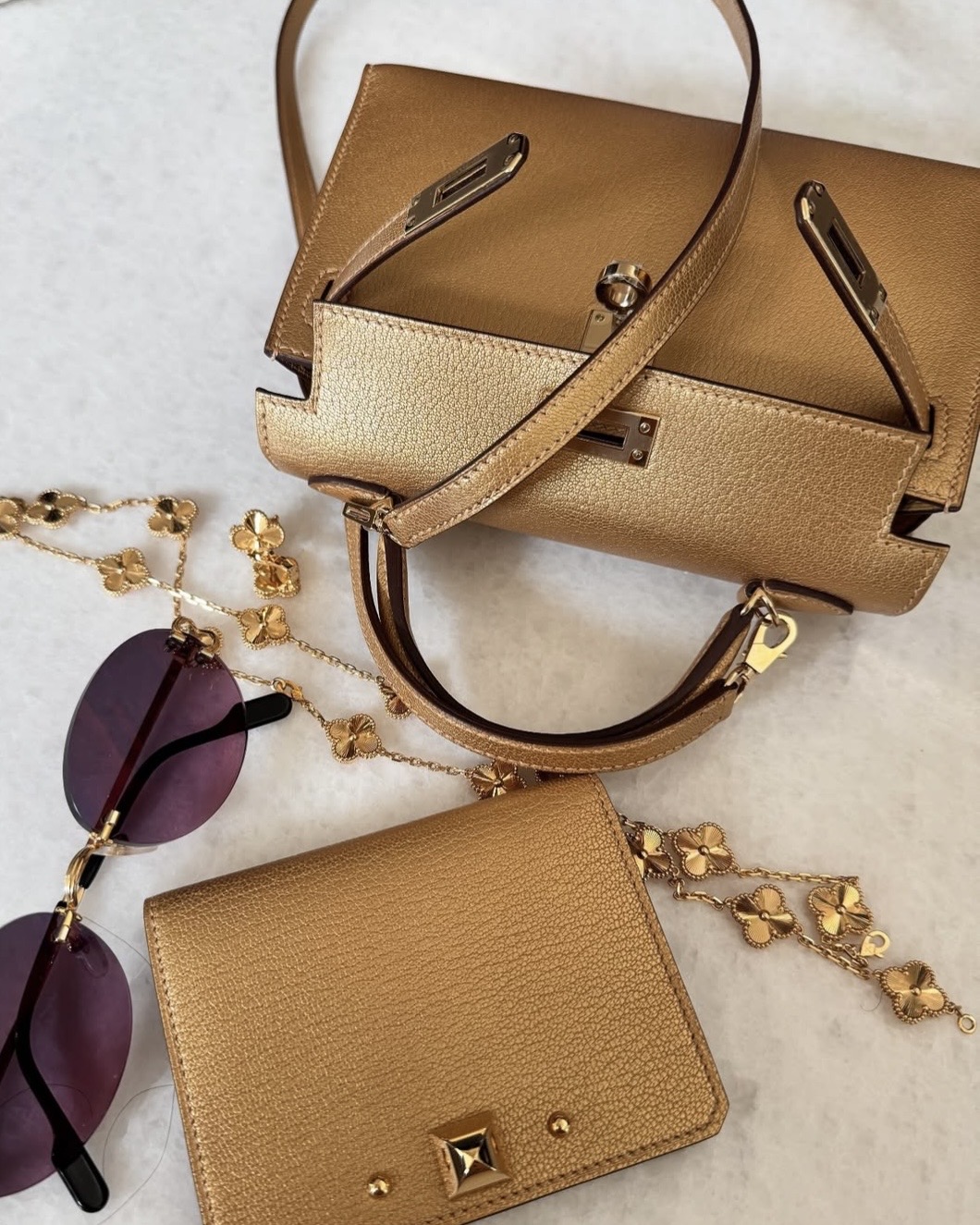 Readers Poll: Which Luxury Brand Does Metallic Bags Best?