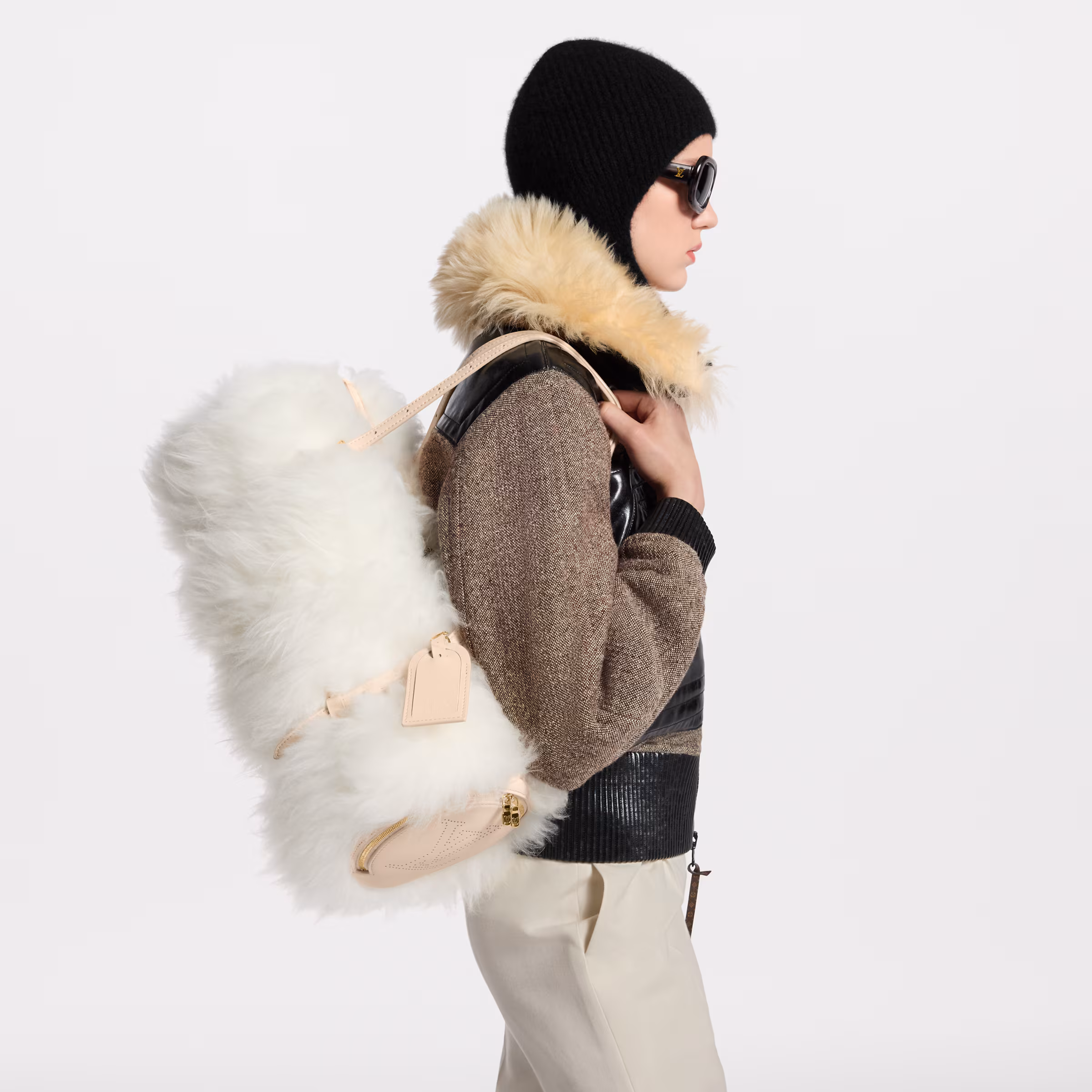 lv ski collection 2026,lv hologram bag,lv silver alma,lv metallic silver speedy,lv shearling bag,louis vuitton ski collection,louis vuitton speedy bag